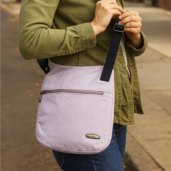 Travelon lilac canvas crossbody messenger bag organizer pockets adjustable strap - Picture 1 of 14